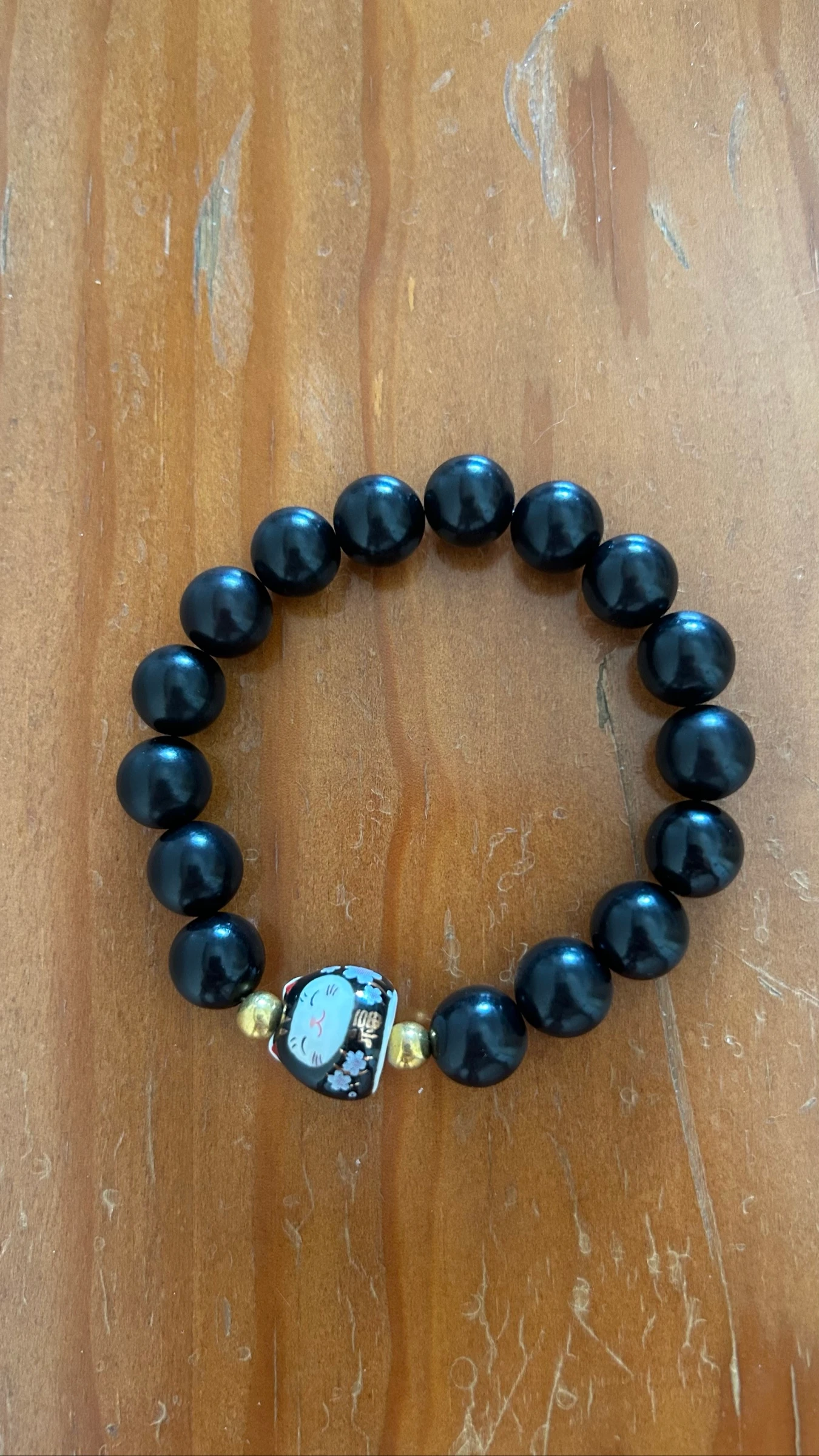 Pulseira bodhi com gato de porcelana